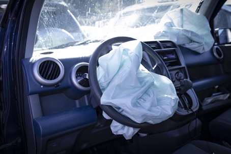 Airbags deployed in auto wreck