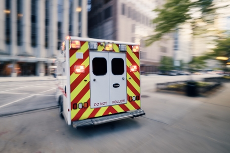 Ambulance car of emergency medical service in blurred motion stock photo