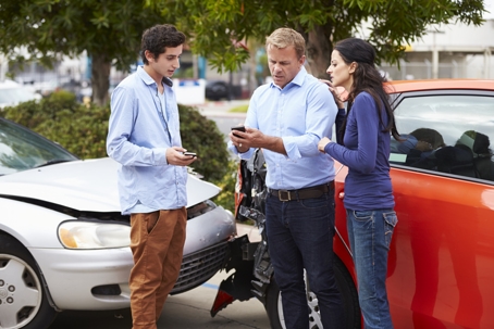 Two Drivers Exchange Insurance Details After Accident stock photo