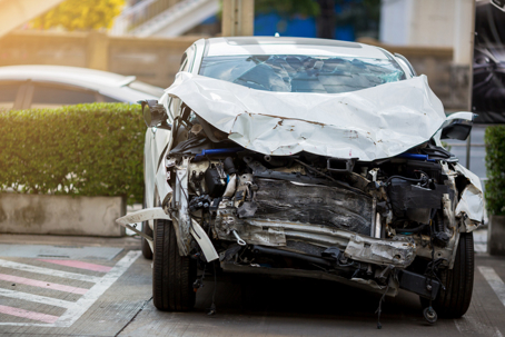 White car crash accident on the road. Sheet metal damage to cars. stock photo
