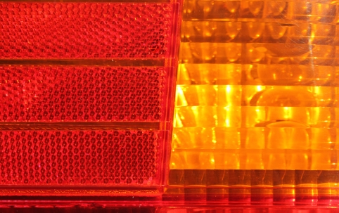 Vehicle rear light close-up abstract textured background stock photo