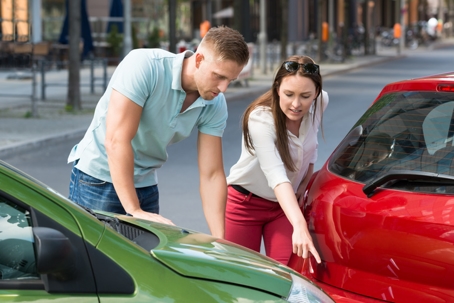 Woman Showing Man Car Collision stock photo