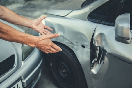 Man with broken car in street stock photo