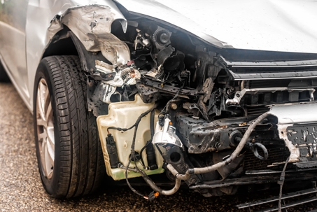 Crashed Car with Damaged Front Bumper stock photo