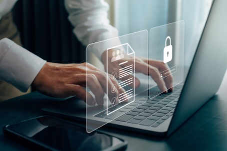 Businessmen protecting personal data on laptop and virtual interfaces