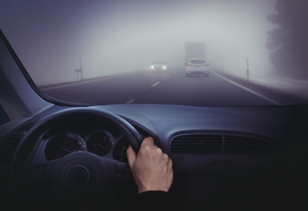 Driving in the fog stock photo