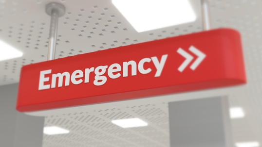 Red emergency sign in a brightly lit hallway. 3d rendering concept of urgency. stock photo