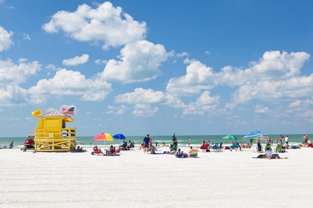 Siesta Key Beach of Florida Gulf Coast with Tourists Sunbathers stock photo