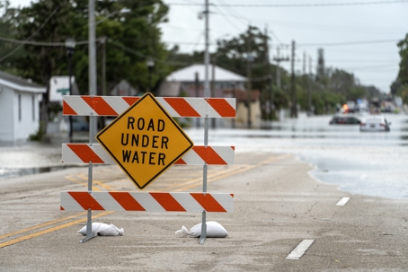 Road Under Water Sign on the highway
