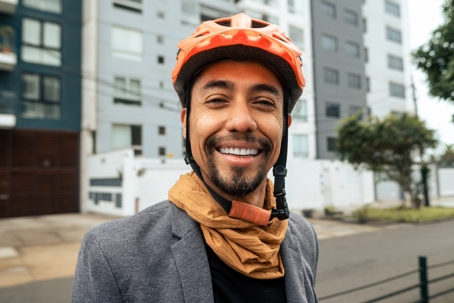 Happy portrait of a Latino urban cyclist stock photo