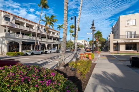 Historic district in old Naples, Florida showcases charming streets lined with shops and beautiful landscaping