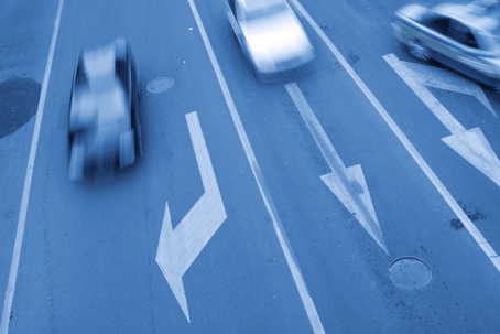 Blurred cars faster move on road stock photo