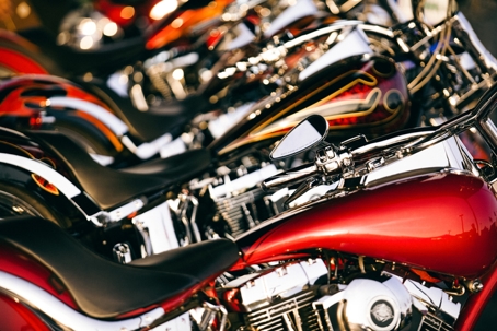 A row of Harley Davidson motorcycles lined up at the dealership during Bike Fest 2006