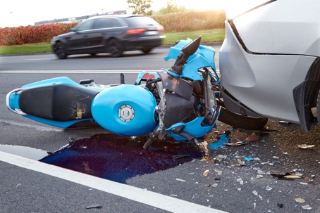 Damaged in a car accident motorbike stock photo