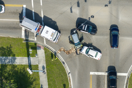 Car accident on highway road in Florida. Emergency services personnel helping victims of vehicle crash on city street in USA stock photo