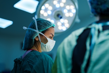 Surgeon and Nurses at Surgery Room