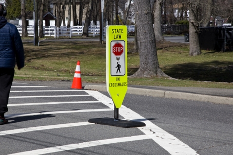Pedestrian in crosswalk stock photo
