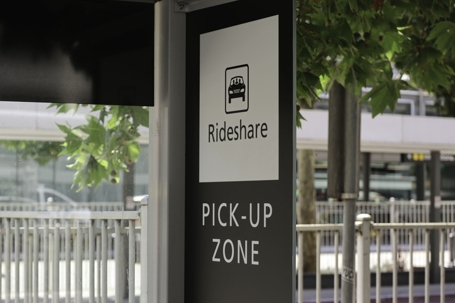Black and white ride share pick-up zone