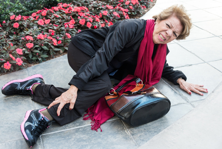 Fallen senior woman stock photo