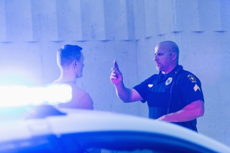 Policeman performing sobriety test on driver stock photo