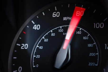 Breaking the speed limit - driving too fast stock photo