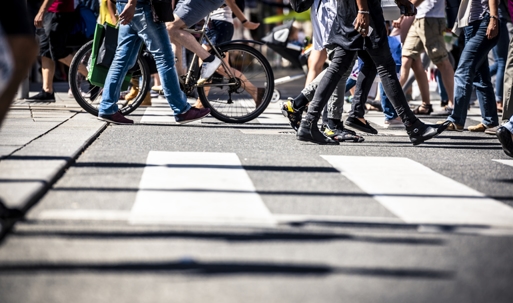 Street traffic with cyclists and pedestrians