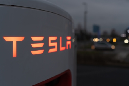 Tesla supercharger at night stock photo
