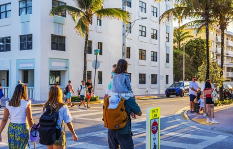 Pedestrians crossing the street in Florida